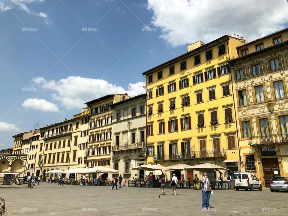 Yellow buildings on the square in Florence