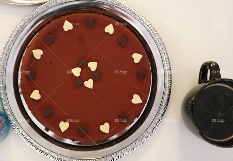 chocolate cake with heart decorations