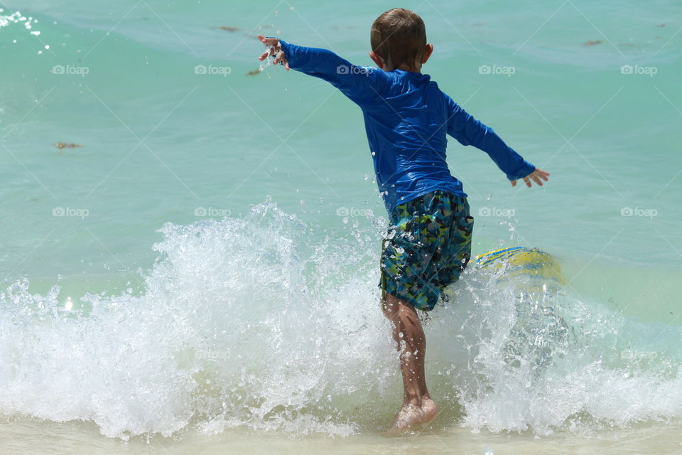 boy surfing