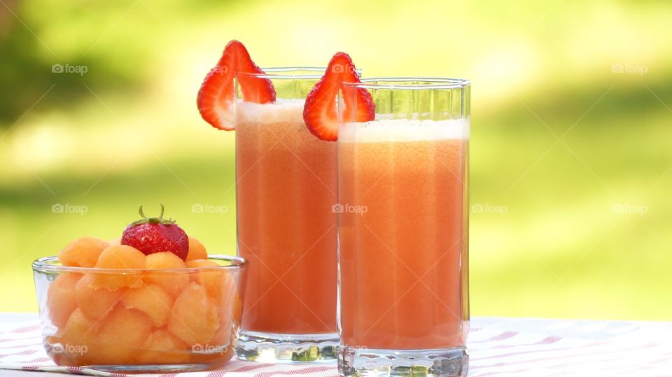 Homemade cantaloupe and strawberry juice