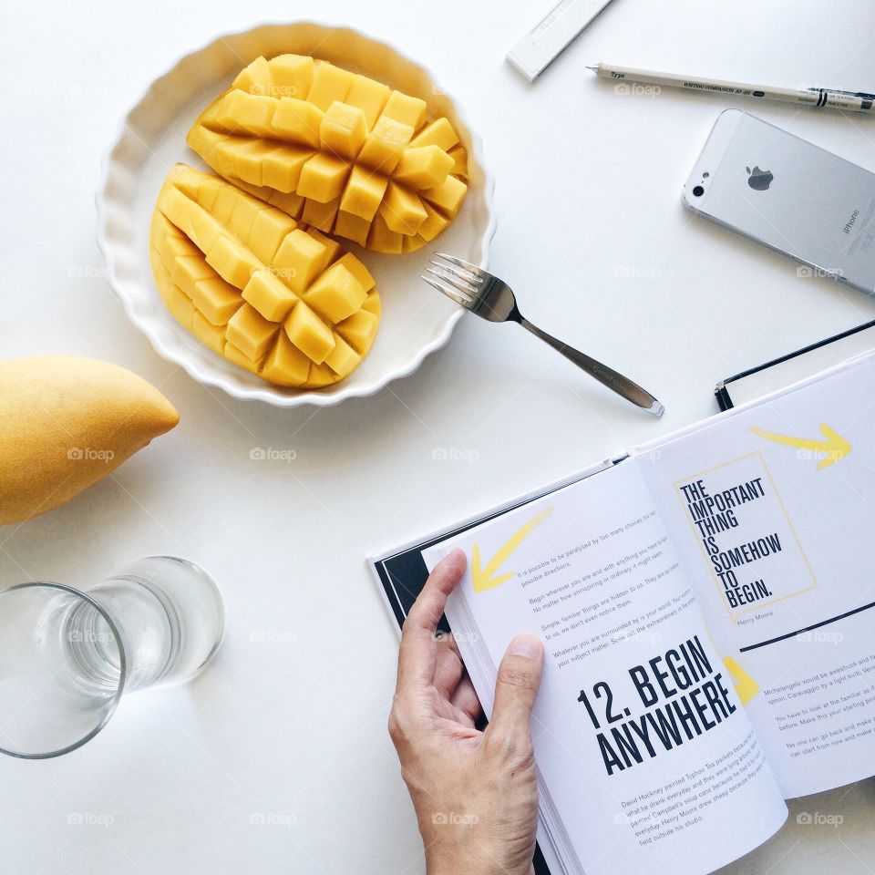 Reading and eating mangos 