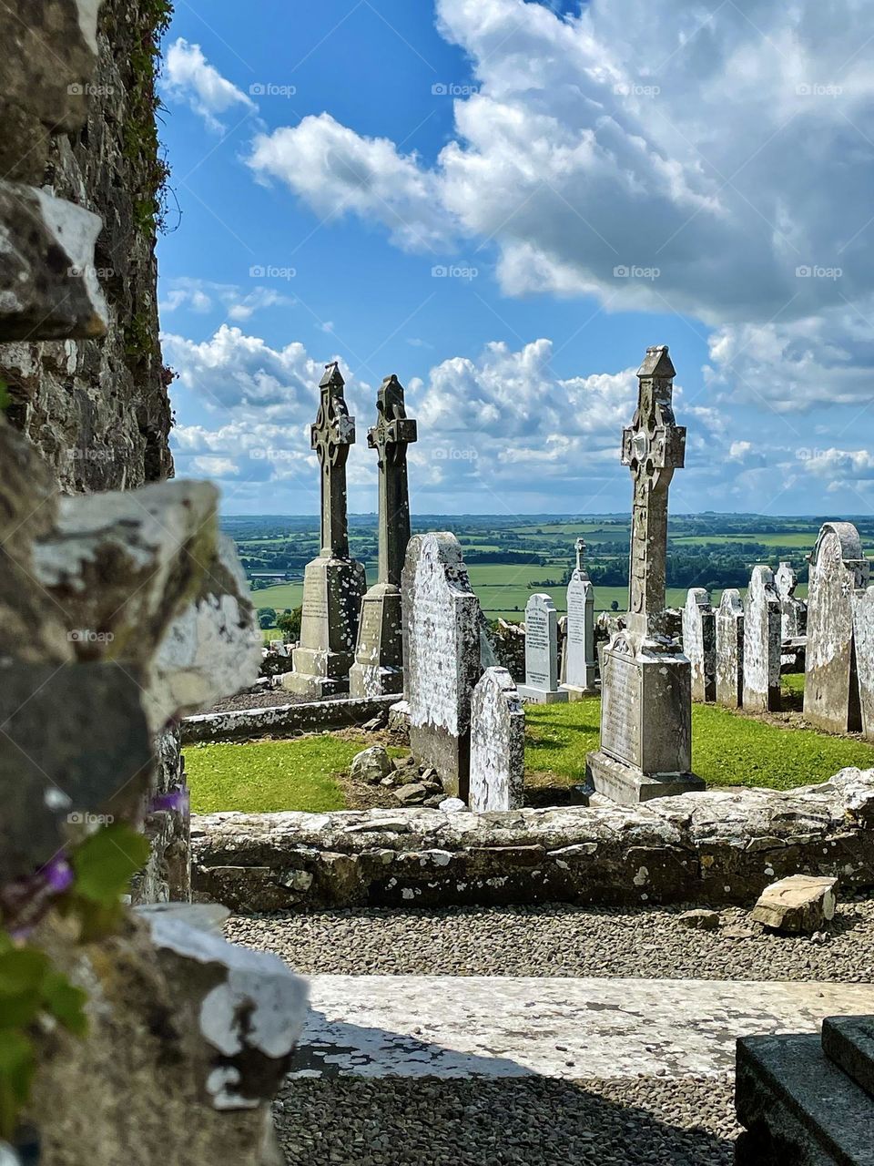 Celtic crosses mark the landscape in an Irish cemetery on the Hill of Slane, Ireland.