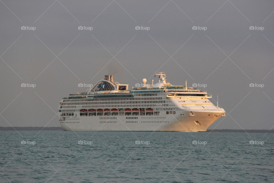 Sun princess departing Darwin at sunset