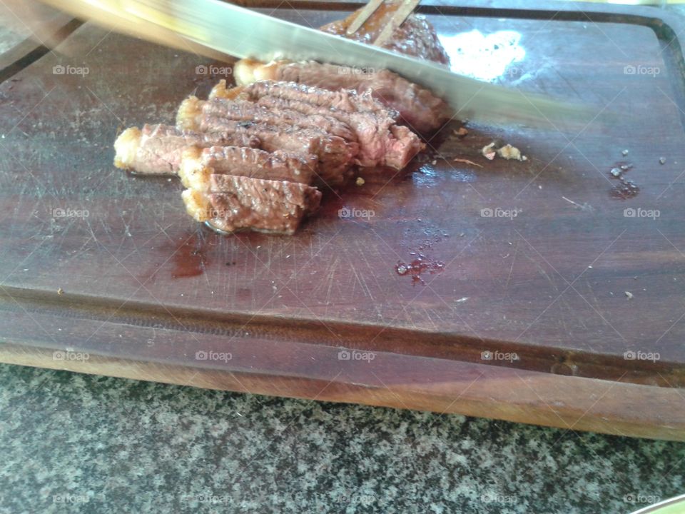 delicious steak made on the grill, made at a street barbecue spot