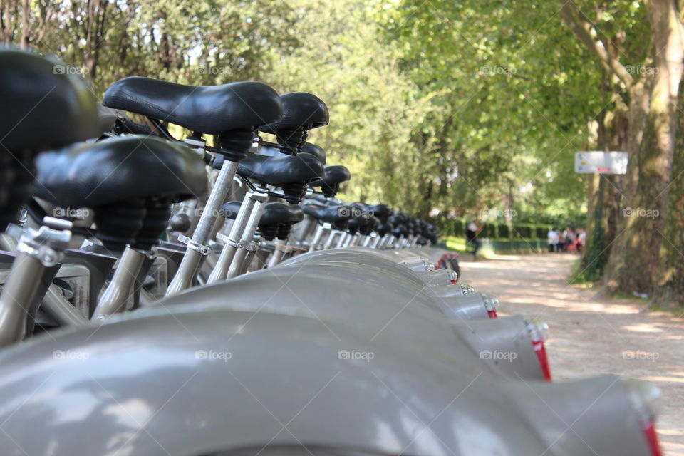 Paris is a bike friendly city where you can see perfectly ordered bikes all around the city.  Seats adjusted for the last user of the bike.