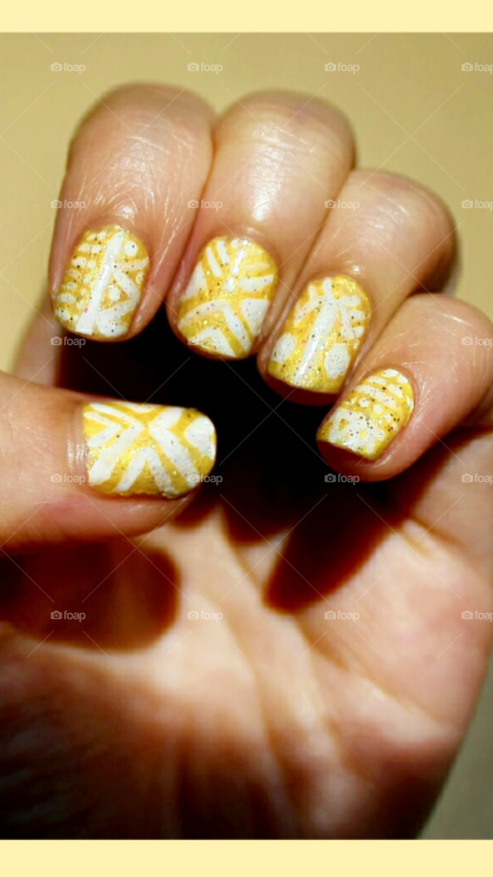 yellow tribal nail art