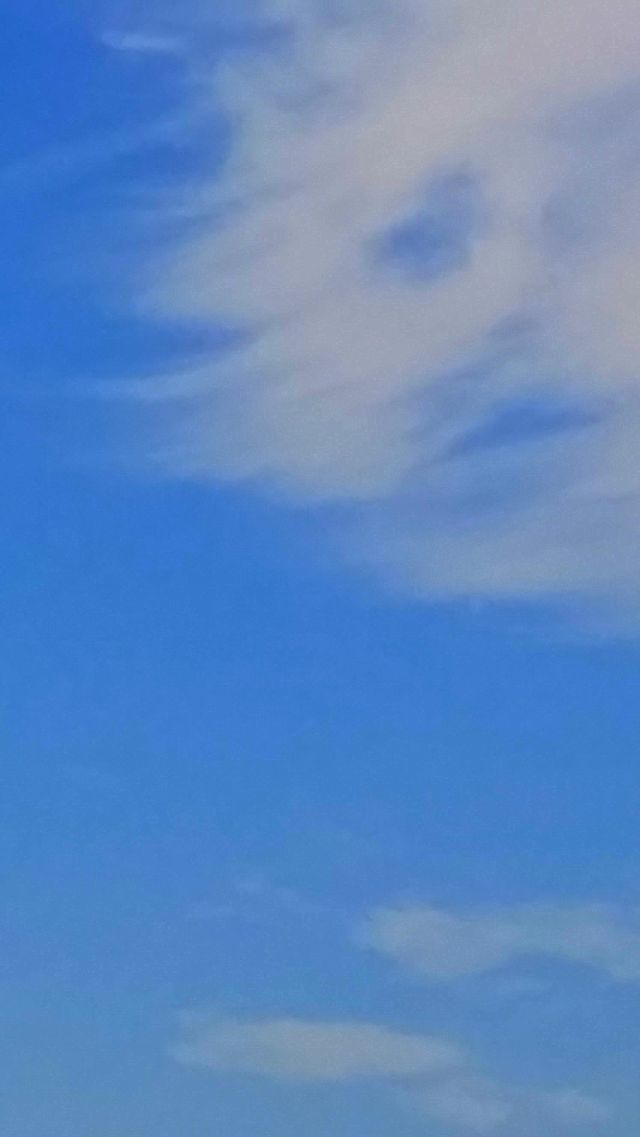 A Face In The Clouds. A beautiful summer day at Encinitas beach.