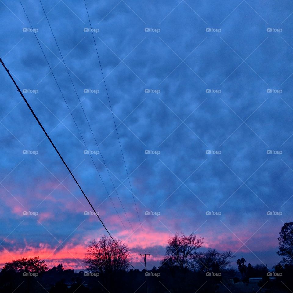 Cloudy blue and pink Californian sunset, promising cool air and perhaps even a bit of rain.