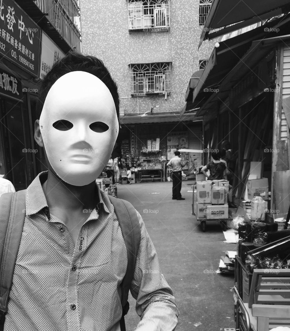 Chinese Man wearing Mask at Dafen Oil Painting Village - Shenzhen, China