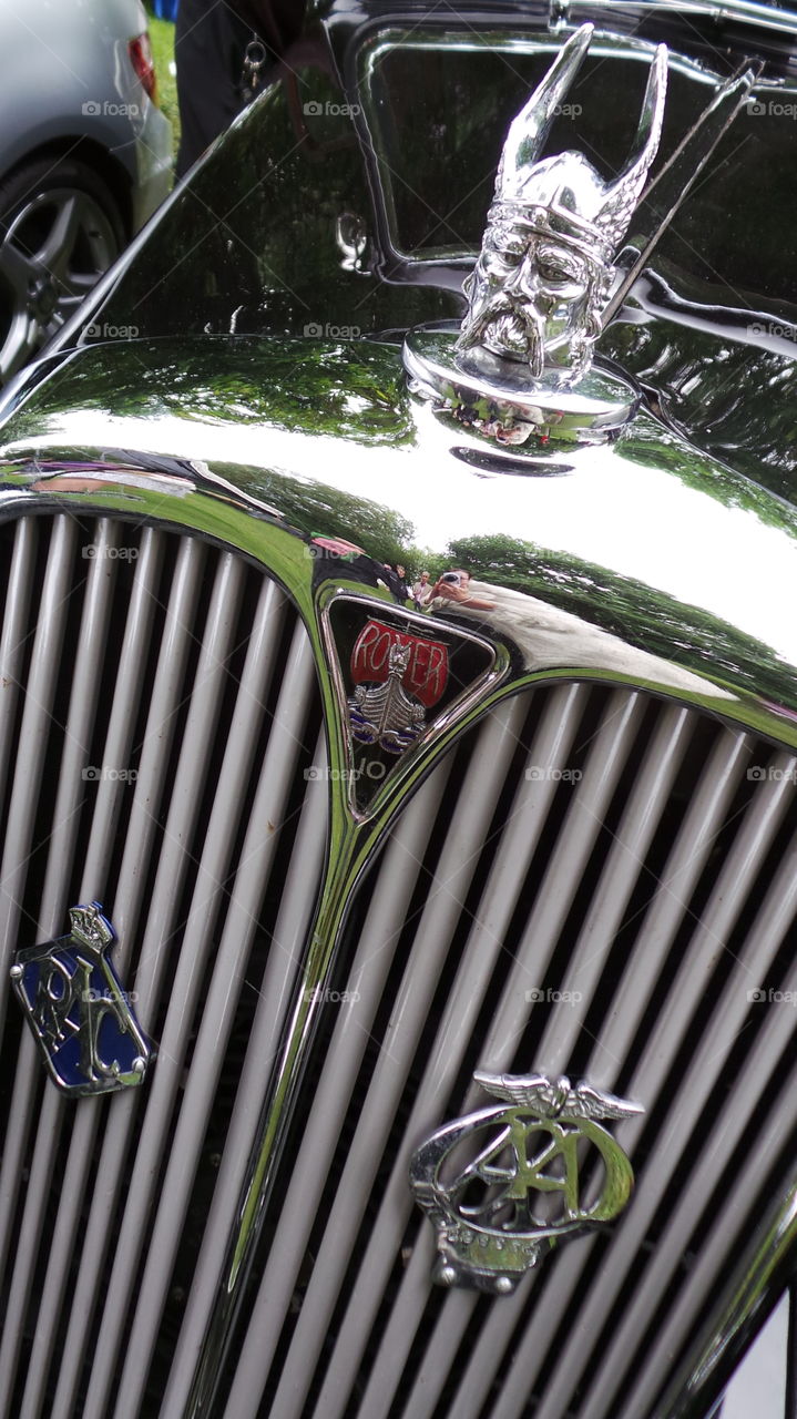 rover badge on a bright chrome grill.
