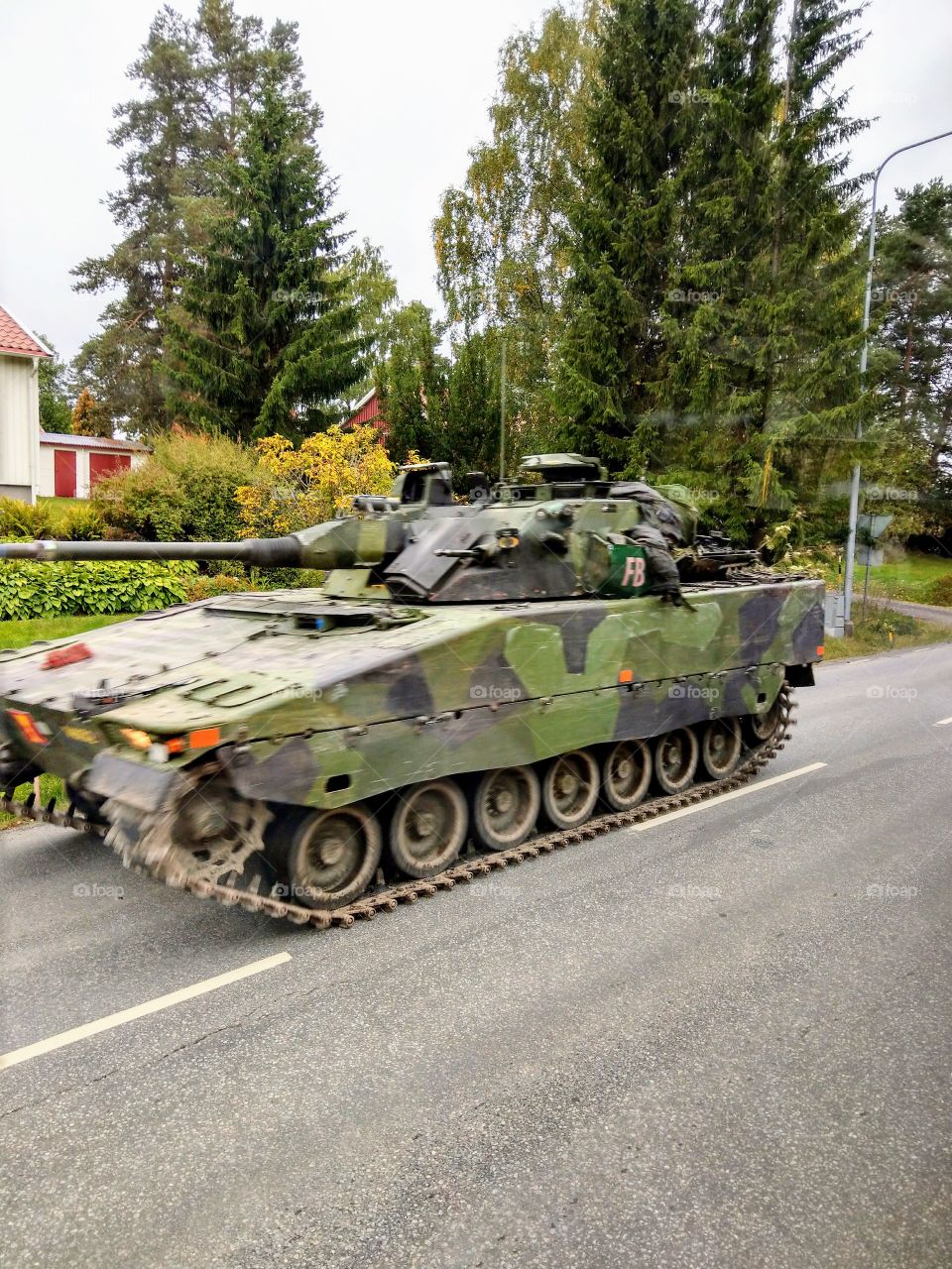 army rolling through the streets