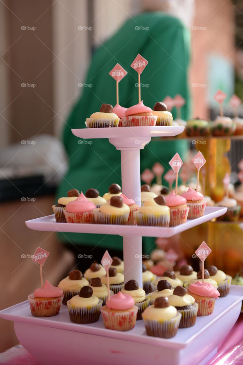 mini cup cakes on a candy table