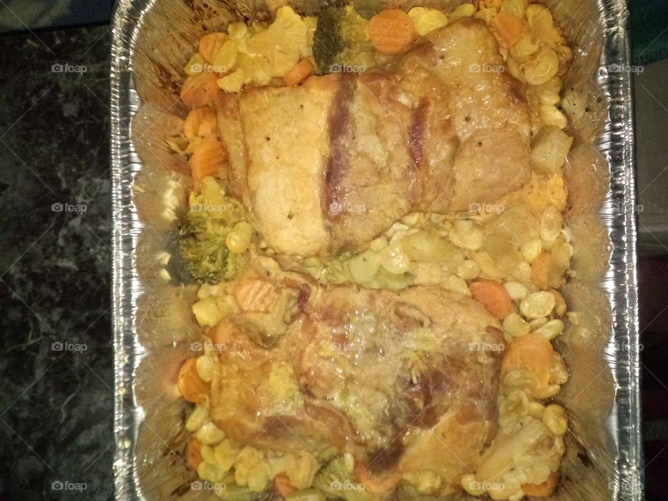 delicious boneless pork loin rice with Lima beans broccoli carrots & cauliflower