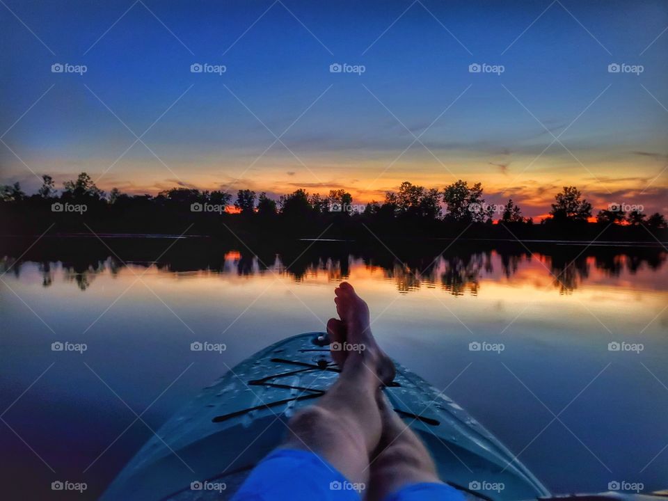 sunset on paddleboard