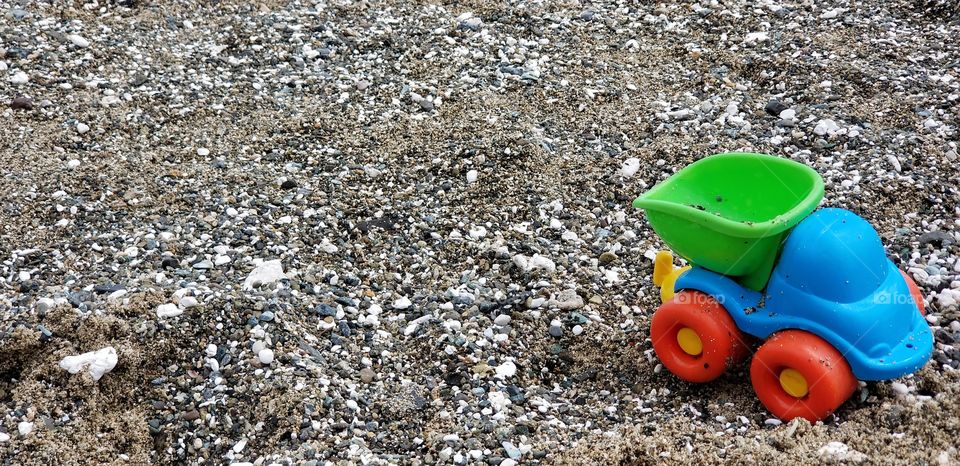toy truck in the sand