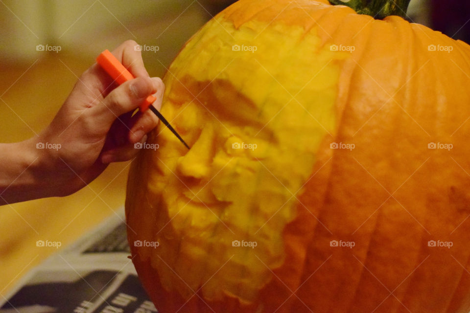 Carving pumpkins for Halloween jack-o’-lantern