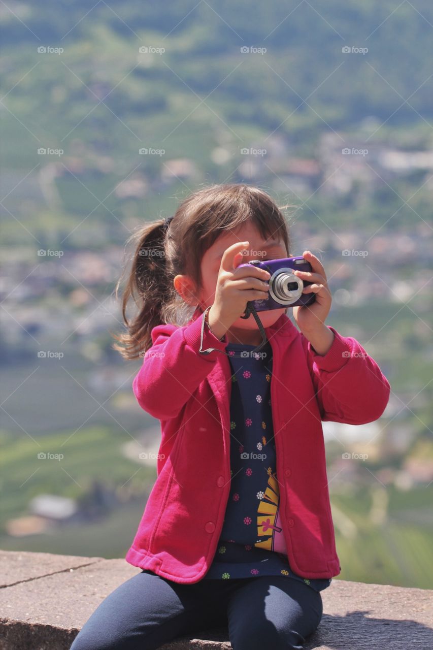 A child takes a picture 