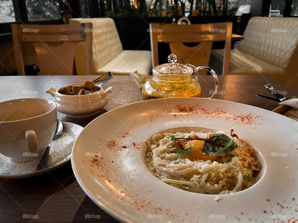 Pasta and buckthorn tea with honey