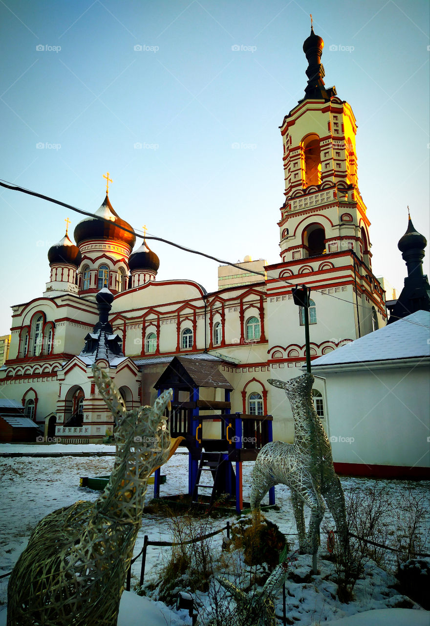Sunset in the winter.  The shine of the domes of the church from the last rays of the sun