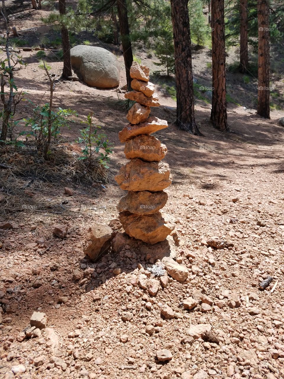 Zen rock stone stack in nature on mountain hike