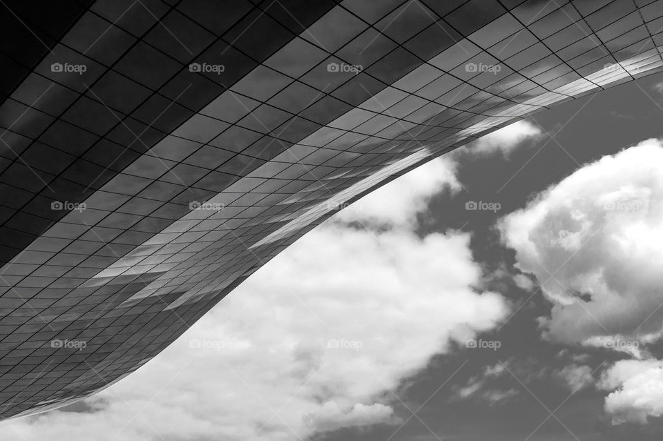 Black and white low angle photo of glass roof of modern building