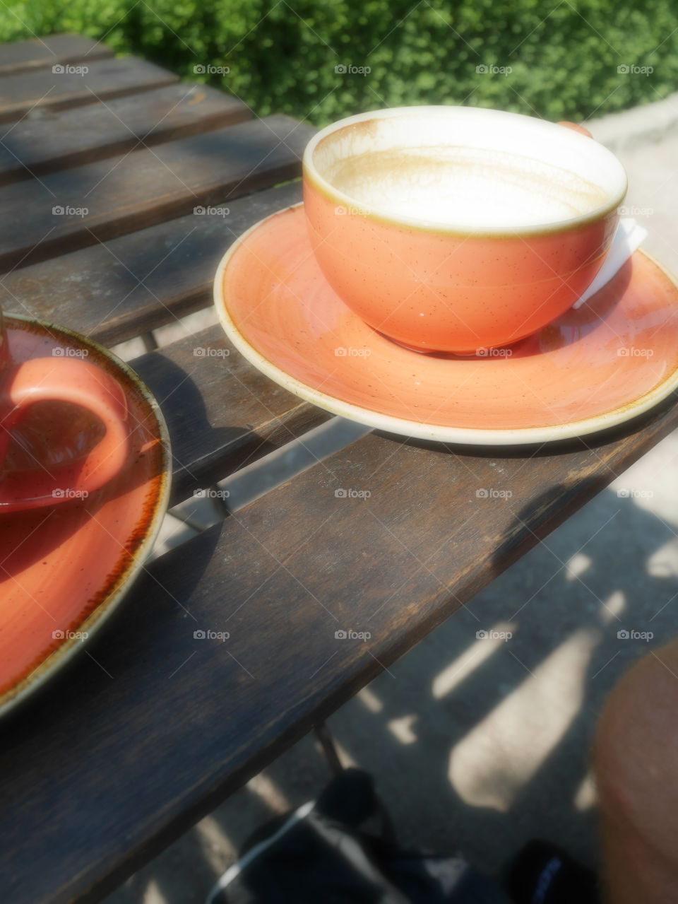 Orange ceramic coffee cup 