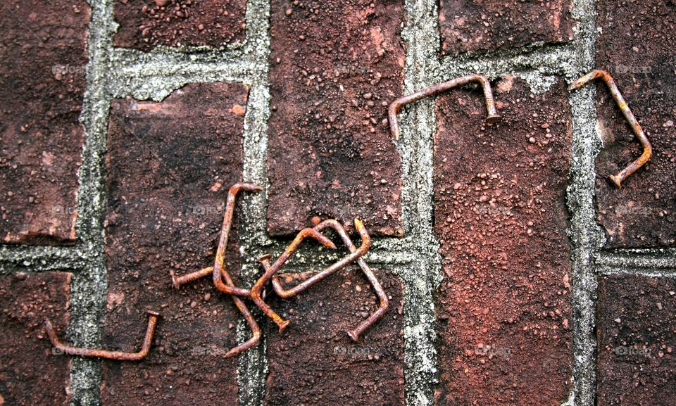 bent nails rusting on a