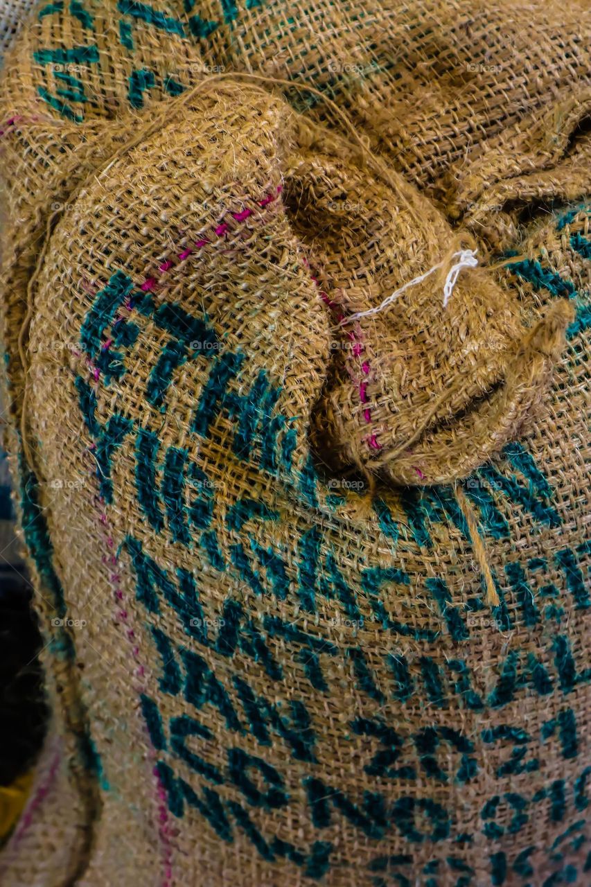 Burlap bags of Ethiopian coffee beans waiting to be roasted and served up hot to satisfy your needs 