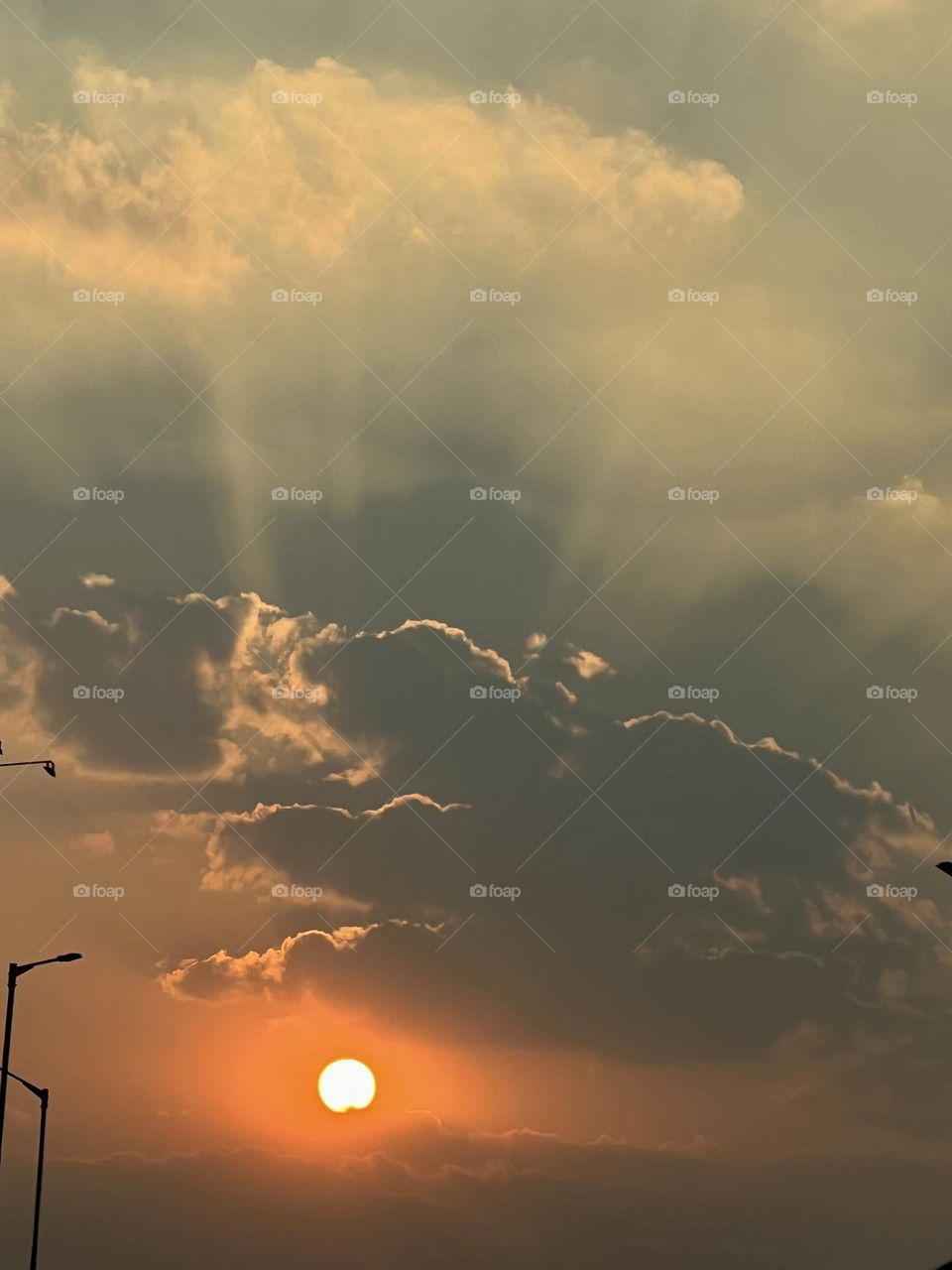 Urban sunset , evening rays .