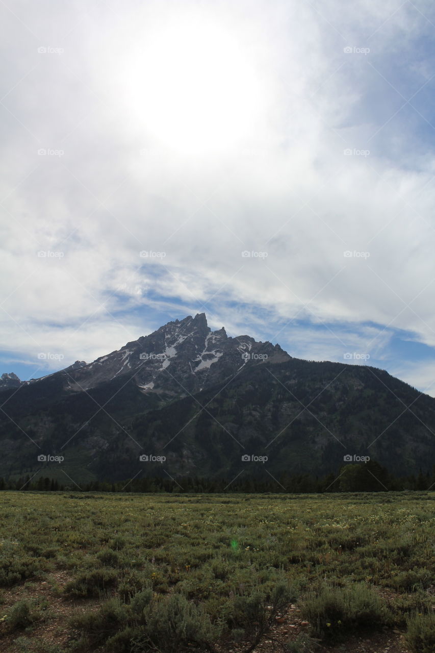 Nature field Prairie Mountain Mountain View hiking outdoors wilderness clouds cloudy scenic beautiful