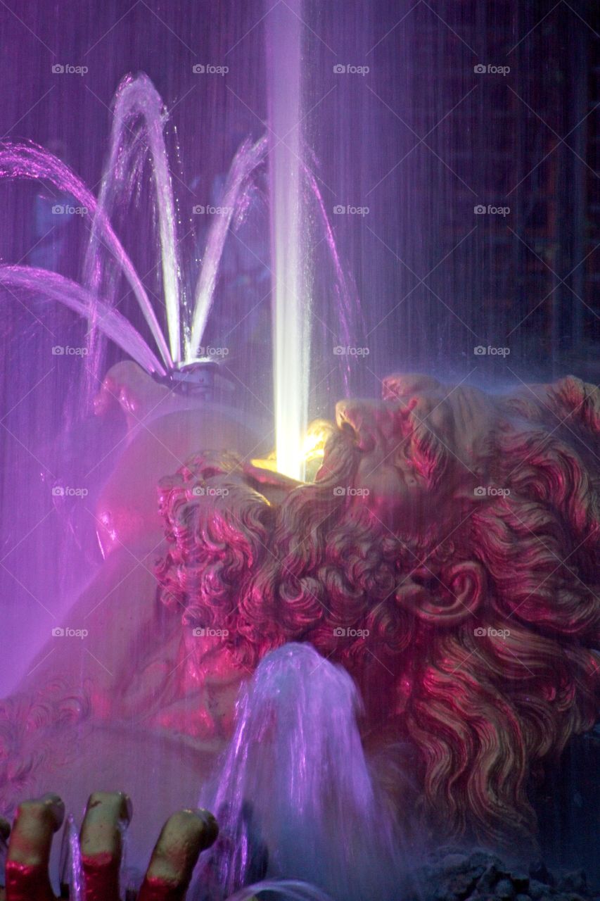 statue of a person in a garden