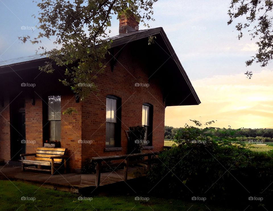Old building with bench and scenery