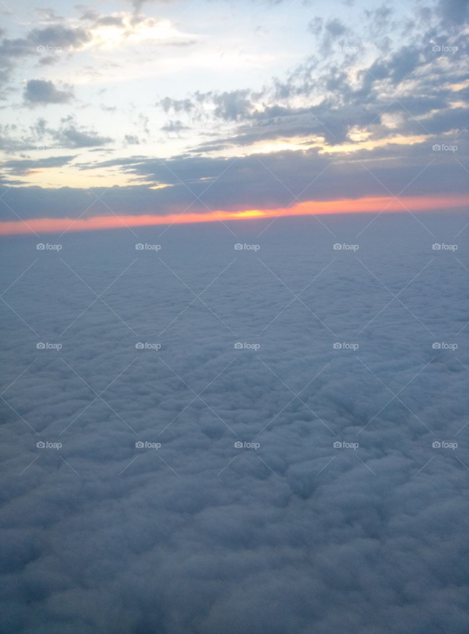 Sea Of Clouds. Sunrise in an airplane on a sea of clouds. 