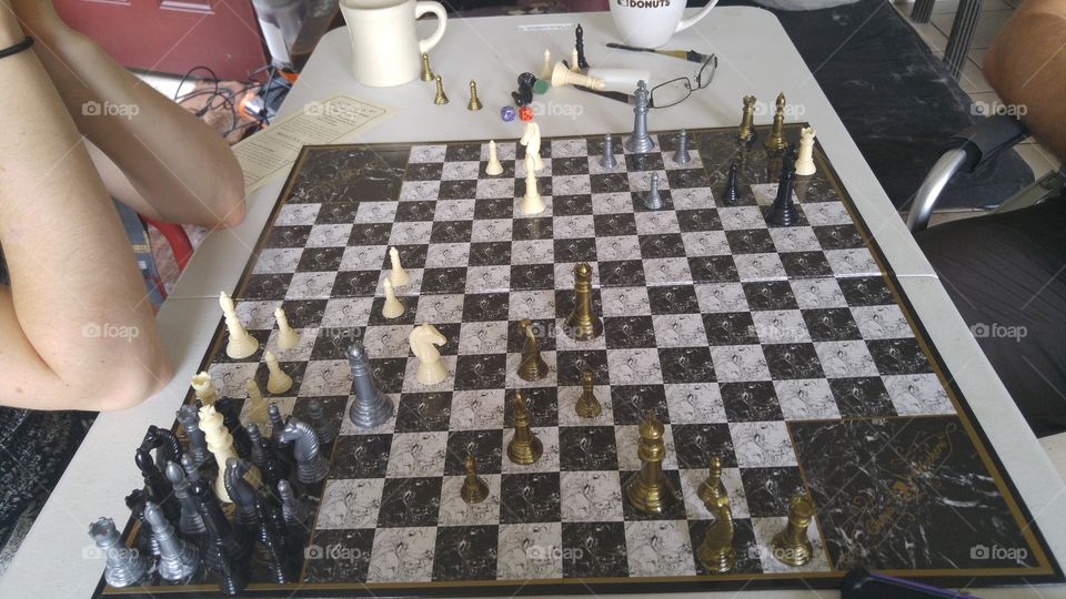 Here's an excellent game: 4 player chess! Oh how quickly the tables can turn. ;D