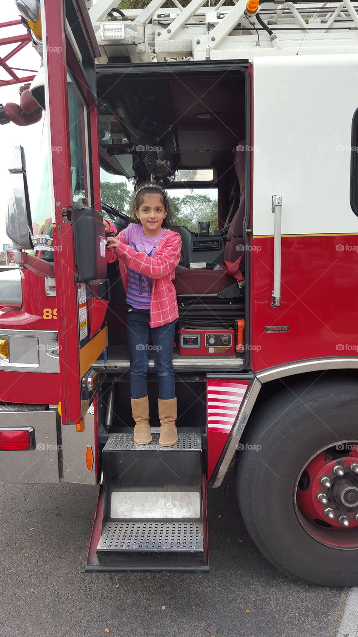 daughter in ladder firetruck