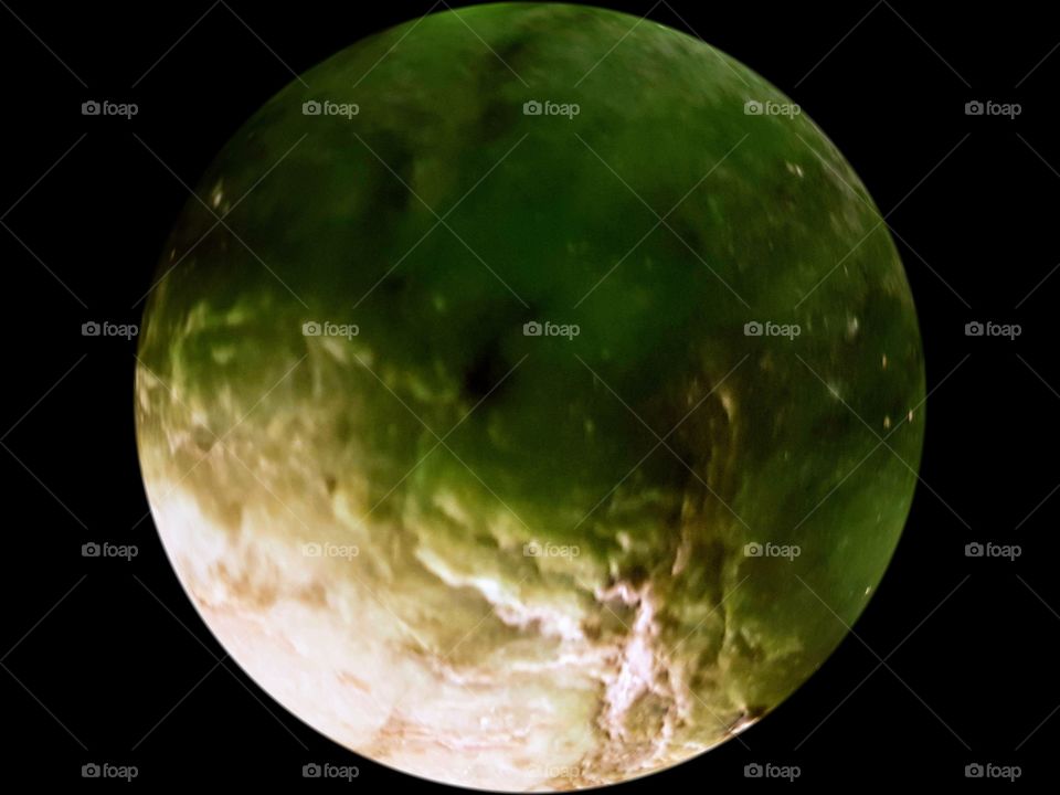 A piece of green stone (paunamu) turned into a beautiful world like photo. I love the effect of polished and rough stone combined. A new planet is born.