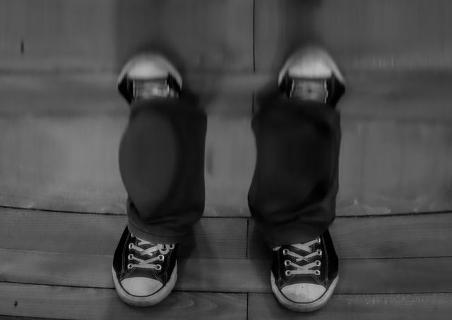 Sneakers on short legs. Sneakers on a very short person.