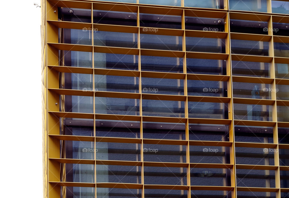 Low angle view of modern skyscraper against sky.