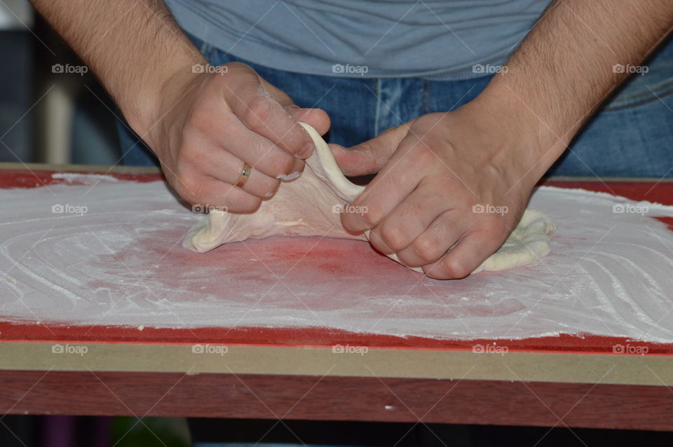 preparing homemade pizza