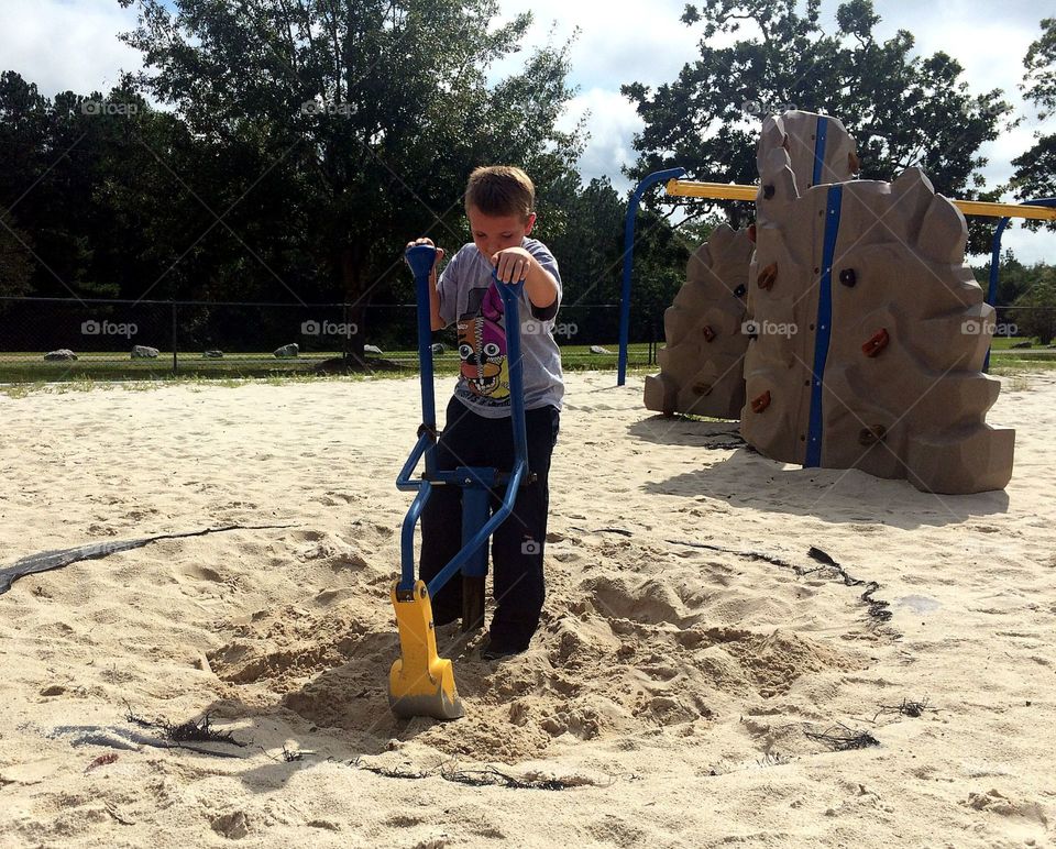 Boy playing in playground