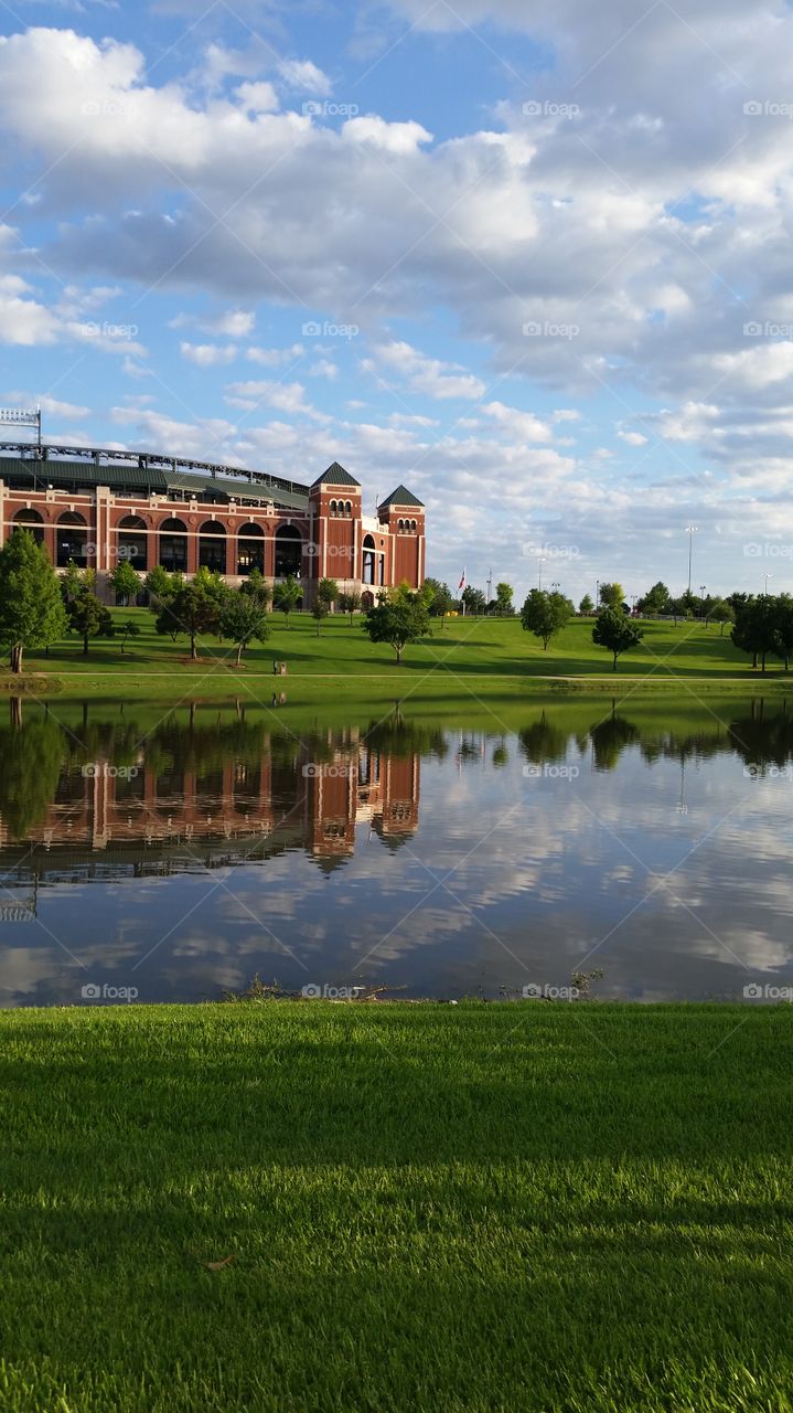 Two Rangers . Rangers stadium watching itself from the pond.... 