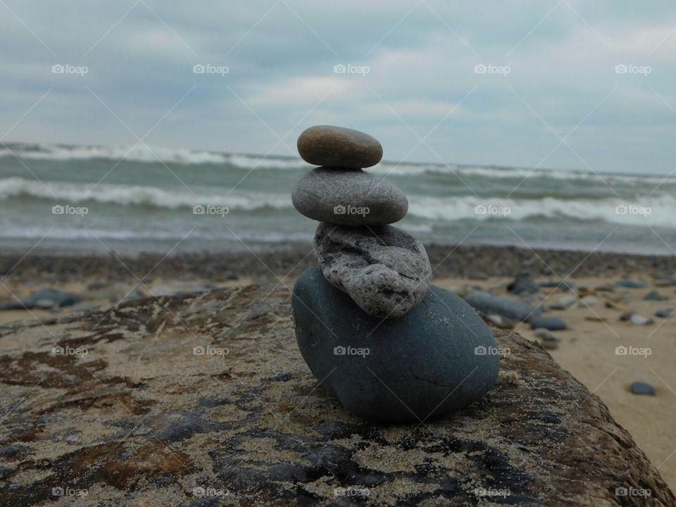 rock cairn at the beach. rock cairn at the beach