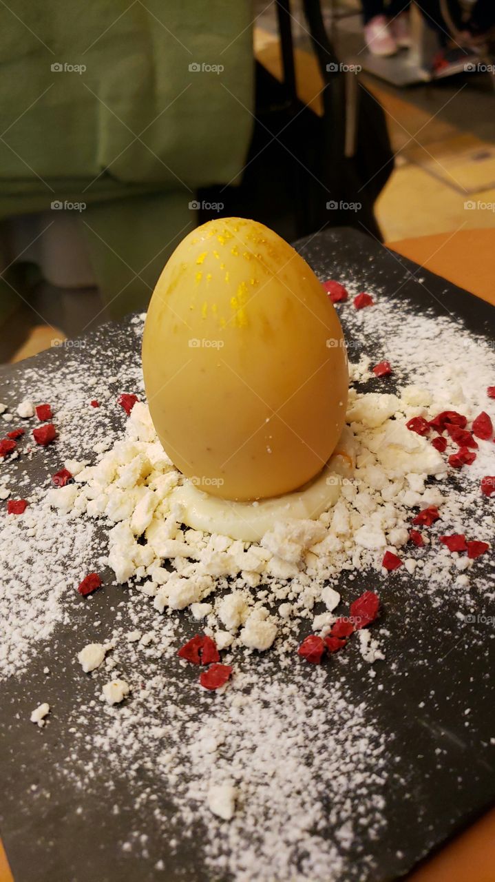 white chocolate egg whit mango yolk inside