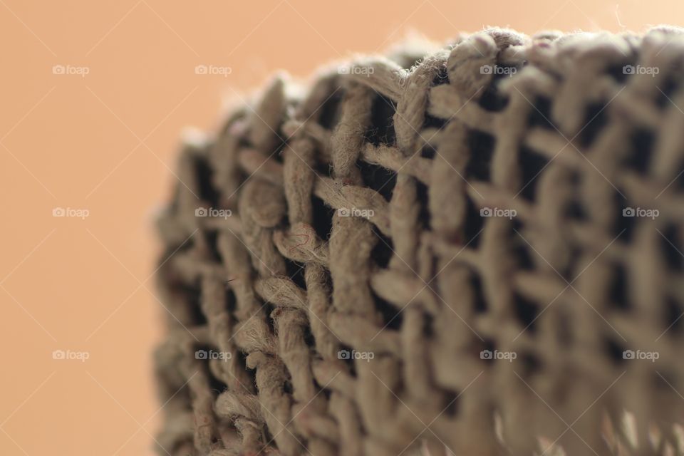Texture of a cloth 
Macro shot of a cloth showing its weaving and texture.