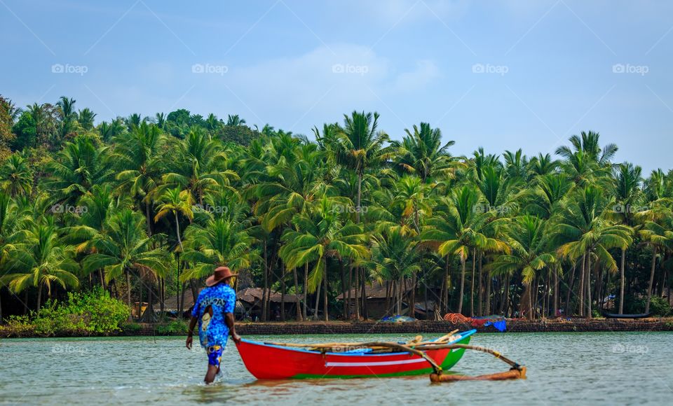 colorful boat and colorful fisherman 🙂