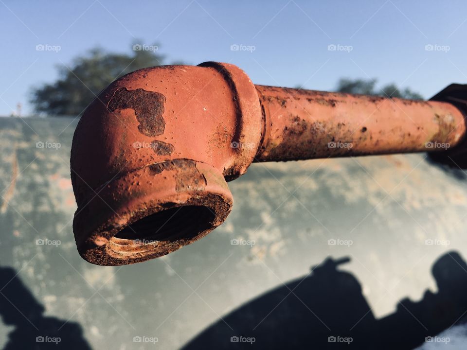 Rusty red metal pipe