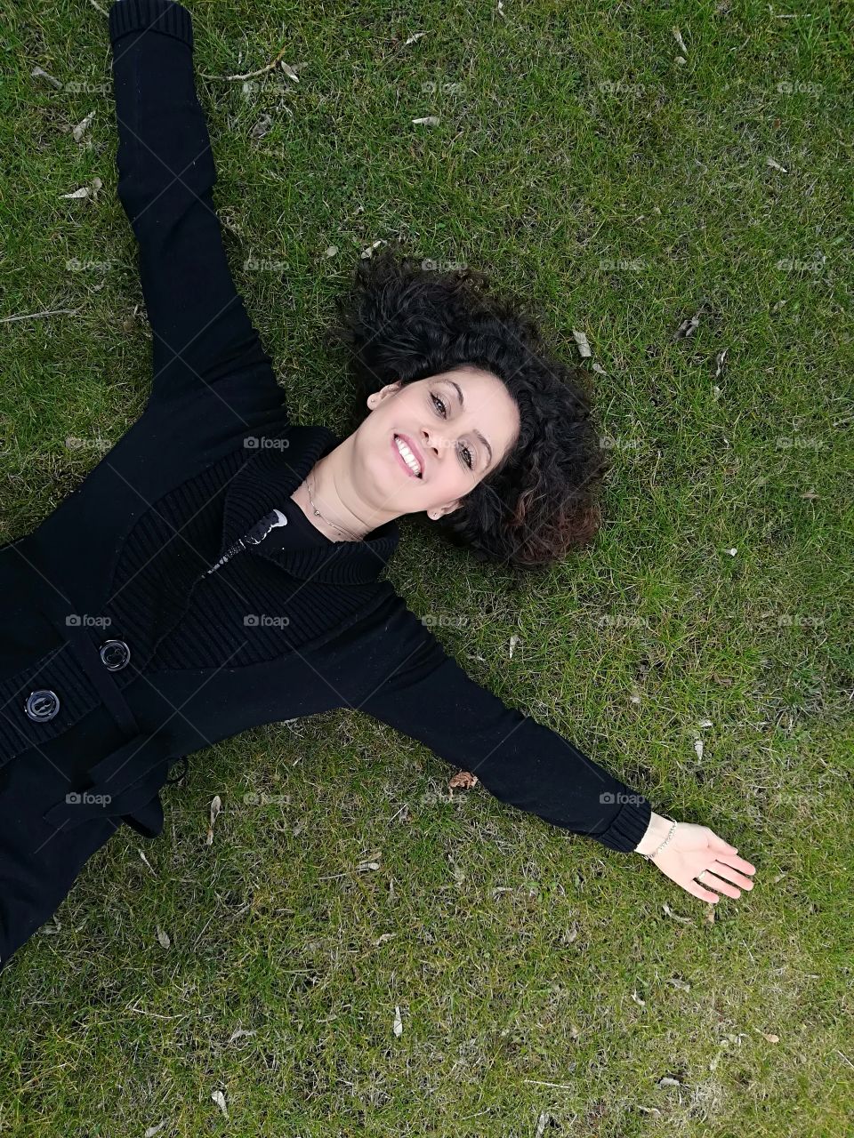 woman lying on the grass