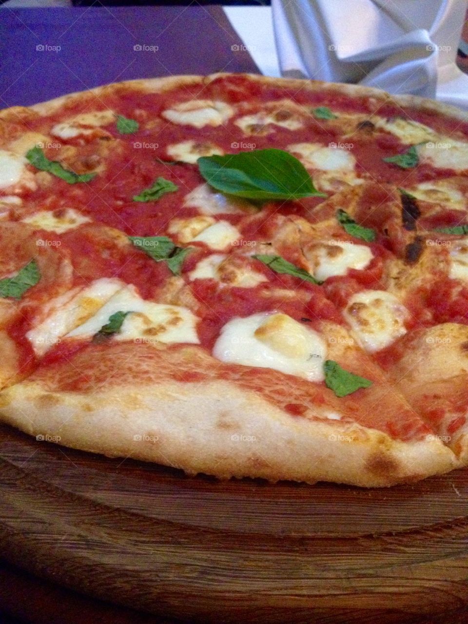 Freshly baked pizza margarita 