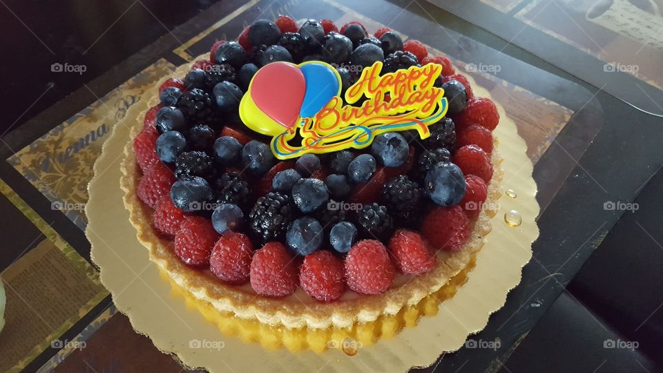 cake topped with berries