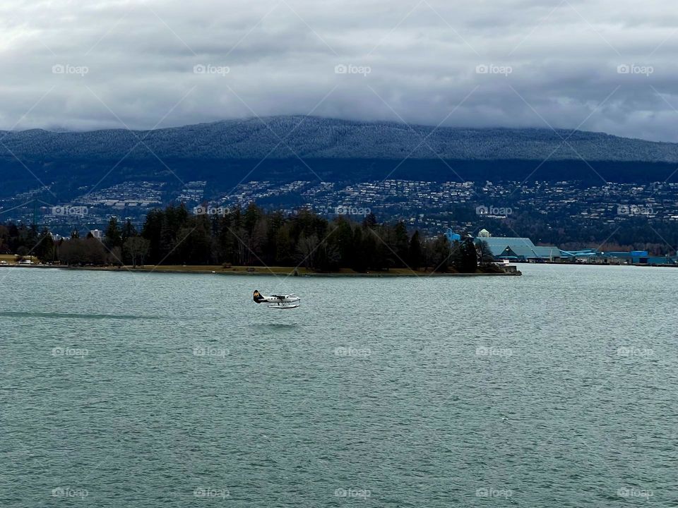 Hydroplane taking off from the Vancouver Harbour in Vancouver British Columbia